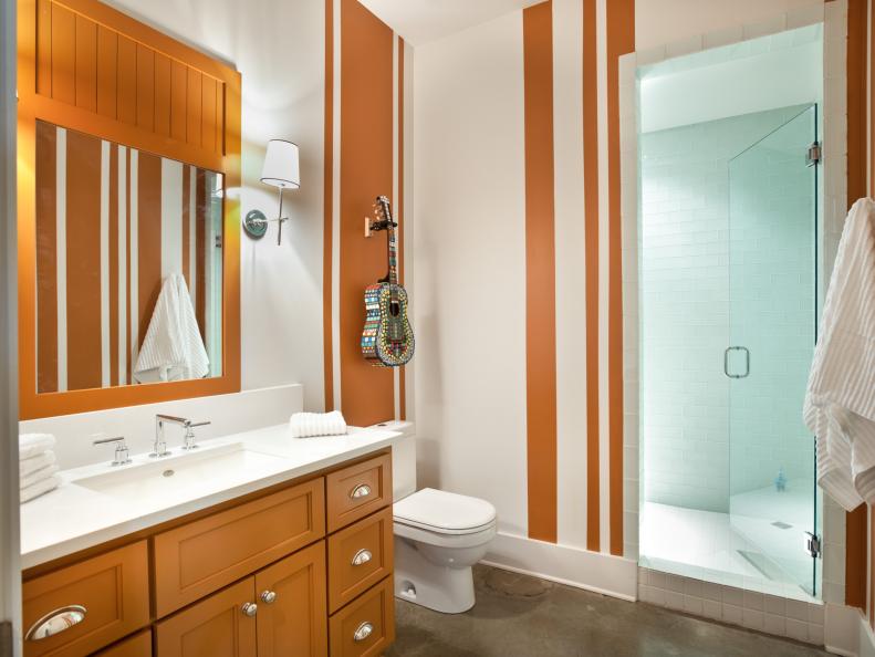Orange Paint and White Fixtures Give Contemporary Bath a Fresh Look