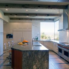 Modern Kitchen with Rustic Beams and Large Granite Island
