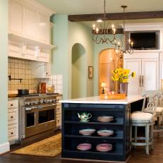 Soft Green Mediterranean-Inspired Kitchen With White Cabinets
