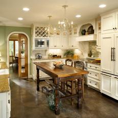 French Country Kitchen with White Cabinets and Chandeliers