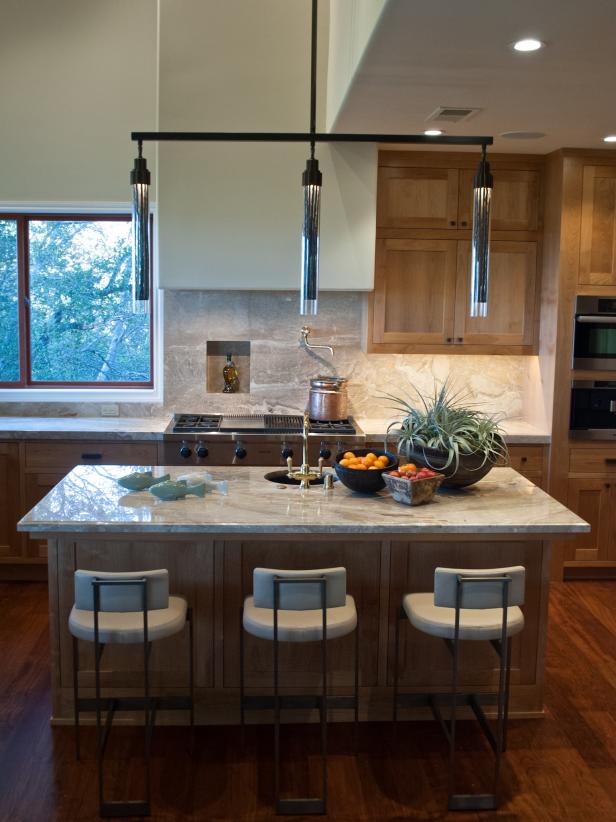 Contemporary Kitchen With Natural Countertops and Wood Finishes | HGTV