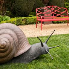 Formal Garden Area with Oversized Snail Sculpture