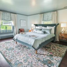 Luxe Bedroom With Antique Nightstands 