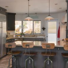 Gray Eat-In Kitchen With Industrial Accents