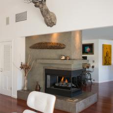 Modern Fireplace Separates Kitchen and Living Areas