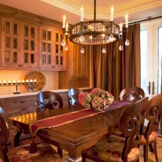 Formal Dining Room With Built-In Cabinetry and Dark Wood Table