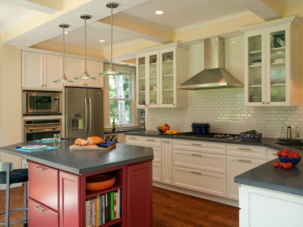 Neutral Kitchen With White Tile Backsplash and Red Kitchen Island