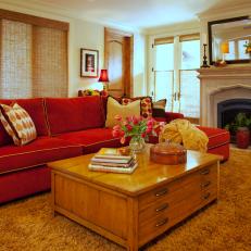 Neutral Transitional Living Room With Red Sofa