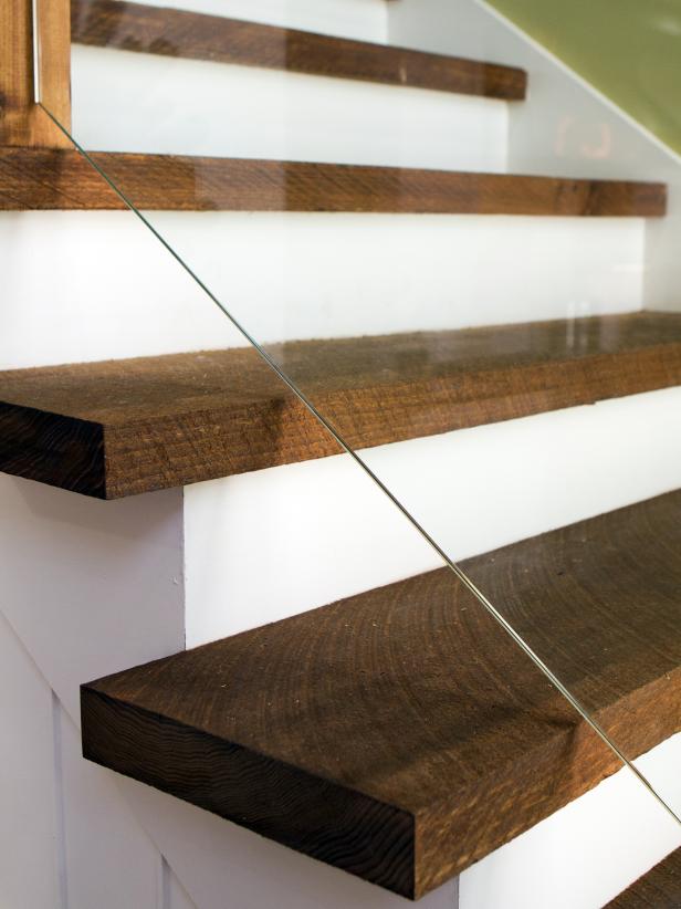 Rustic Wood Stairs With Modern Glass Railing | HGTV