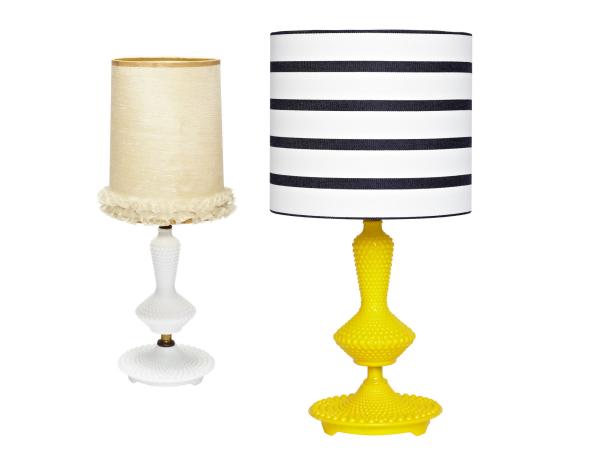 Old hobnail lamp next to a bright yellow lamp with striped lampshade. 