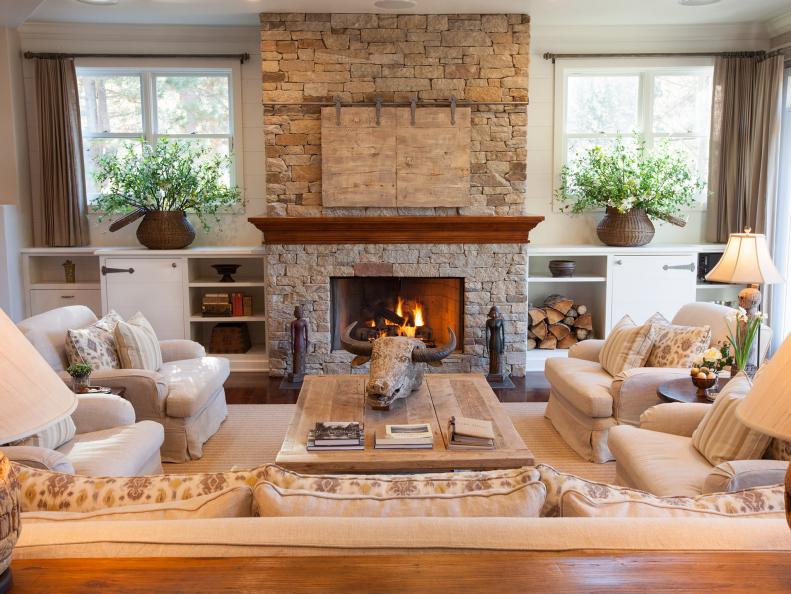 Traditional Living Room With Neutral Furnishings and Stone Fireplace