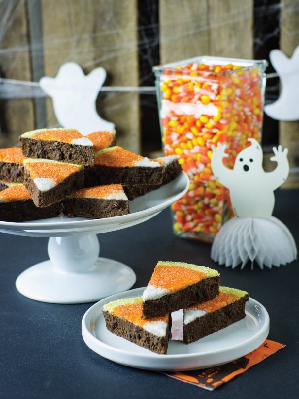 Candy corn gets a new look with these fun Halloween brownies. They are as pleasing to the eye as they are to the palate. Serve on a dessert table with jars filled with real candy corn.