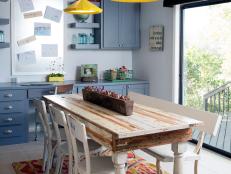 Craft Room With Yellow Pendants, Blue Cabinets & Reclaimed Wood Table