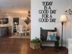 Gray Country Foyer With Custom Metal Wall Sign