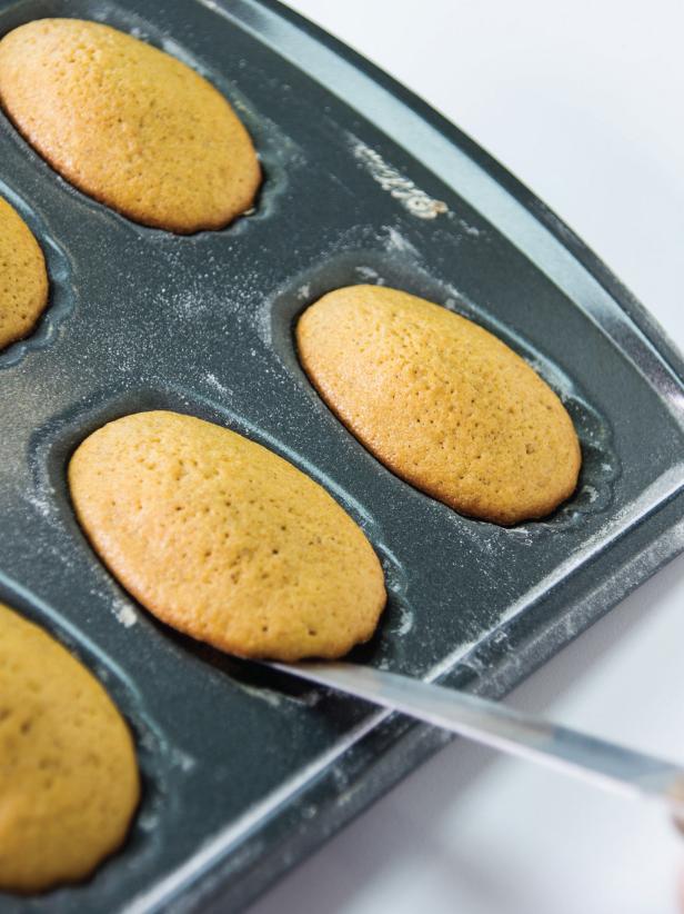 Bake in a 375 degree oven for 12-15 minutes or until cake springs back slightly and edges are browned. Allow to cool only for about a minute before removing them carefully with the tip of a knife. Allow madeleines to cool completely on a wire rack.
