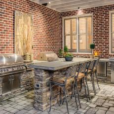 Contemporary Patio with Red Brick Walls