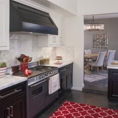 Black and White Kitchen With Red Accents