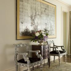 White Hall With Ornate Silver Chairs and Japanese Screen