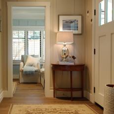 Neutral Cottage-Style Foyer With Board-and-Batten Walls