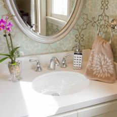 Sophisticated Wallpaper in Single-Vanity Bathroom 