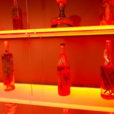 SF-Decorator-Showcase-14-mixologist-quarters-bottles-on-shelves_h