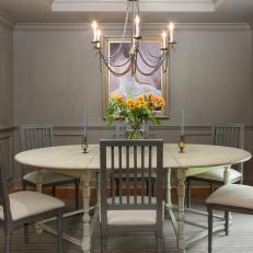Traditional Gray Dining Room With Cream Dining Table