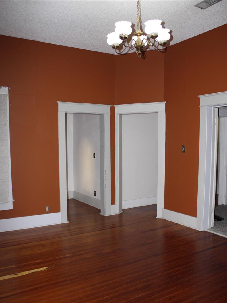 Brown Bedroom With Three Doorways