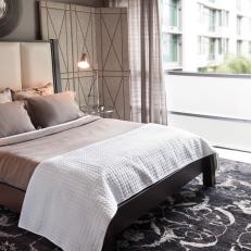Luxurious Black Area Rug in Midcentury Modern Bedroom