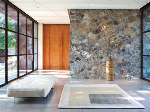 Rustic, Contemporary Foyer With Fieldstone Wall