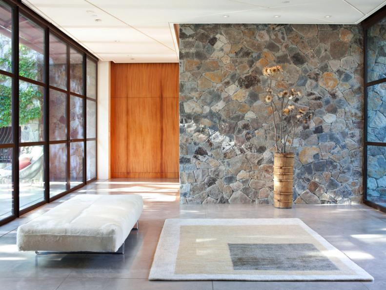 Rustic, Contemporary Foyer With Fieldstone Wall