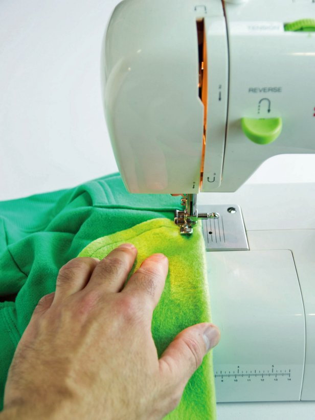 Sew the tummy pieces in place with sewing machine.