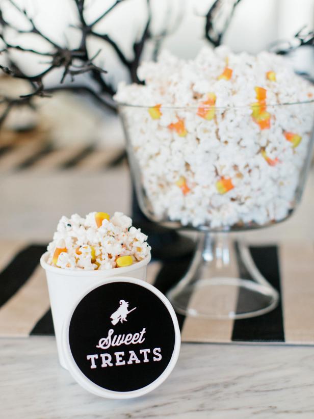 These ice cream cartons are perfect for filling with popcorn mix and giving out as party favors.
