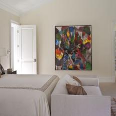 White Contemporary Master Bedroom With Colorful Artwork 