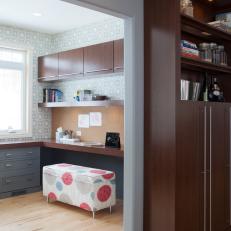 Midcentury Modern Home Office Features Horizontal Cabinets & Circular Wallpaper