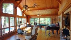 Wood Paneled Great Room With Piano