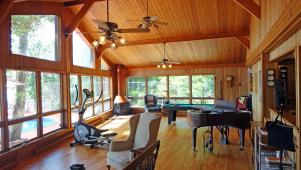 Wood Paneled Great Room With Piano