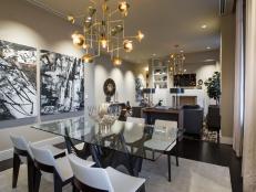 Open to both the kitchen and living room, the dining area offers a sophisticated, modern space to gather and entertain.