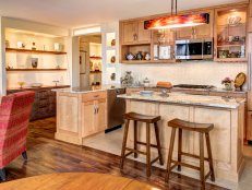 Neutral Eat-In Kitchen With Glass Pendant Light  