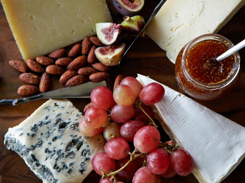 The perfect cheese plate couldn’t be simpler to create, yet will garner oohs and aahs from impressed guests.