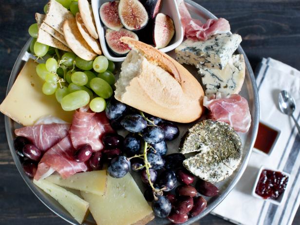 Cheese plate with fruit and bread