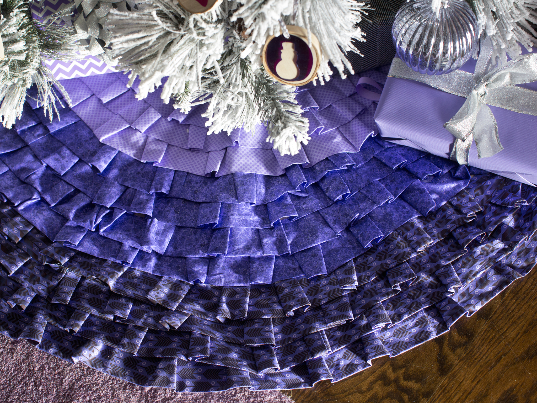 silver and purple tree skirt