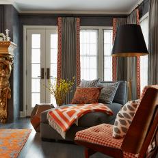 Eclectic Bedroom Sitting Area in Orange and Gray