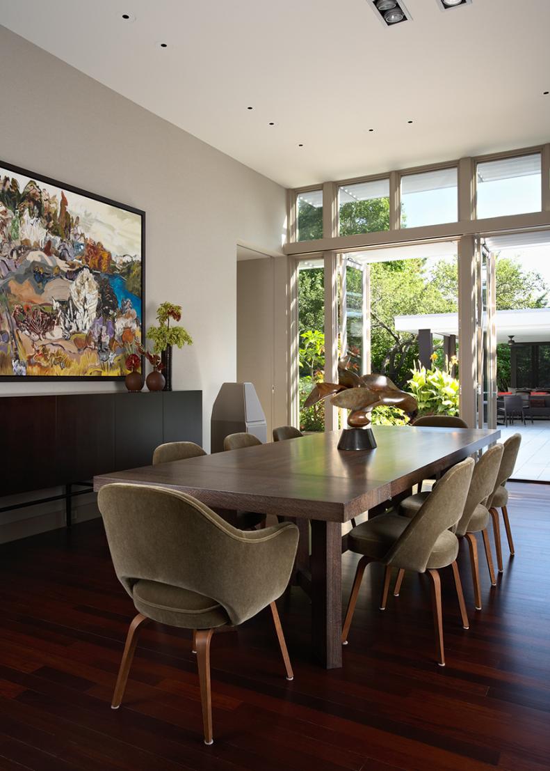 Contemporary Neutral Dining Room With Colorful Artwork