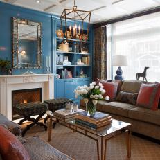 Rich Blue Living Room With White Tulips & Fireside Seating