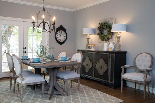 Gray Dining Room with a Wood Dining Table and White Chairs