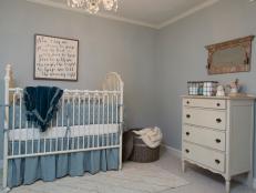 White Crib and Dresser in a Blue Nursery 