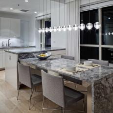 Gray and White Modern Eat-In Kitchen With Gray Marble Table