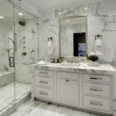White Marble Bathroom With Glass Walk-In Shower