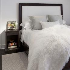 Gray and White Bed With Fur Throw
