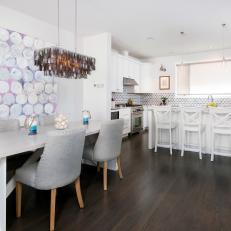 White Dining Area With Purple and White Dot Artwork